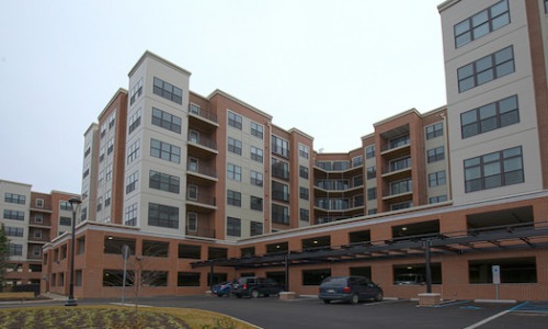 Outside view of 335 Bala near the parking lot and parking garages.