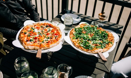 trays of pizza